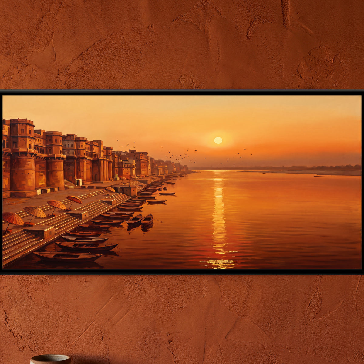 Saffron Sunrise above the Ganga, framed canvas print on a wall